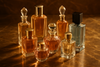 Collection of various perfume bottles on a GOOD background
